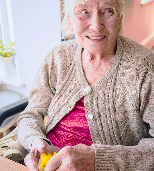 Woman With Dementia Eating Jelly Drops